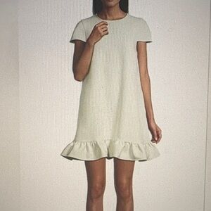 Toxin Chic Cream Ruffle Hem Mini Dress